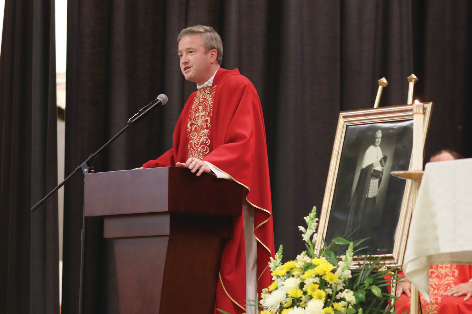 Former Hendricken teacher, Father Timothy Deely served as homilist.